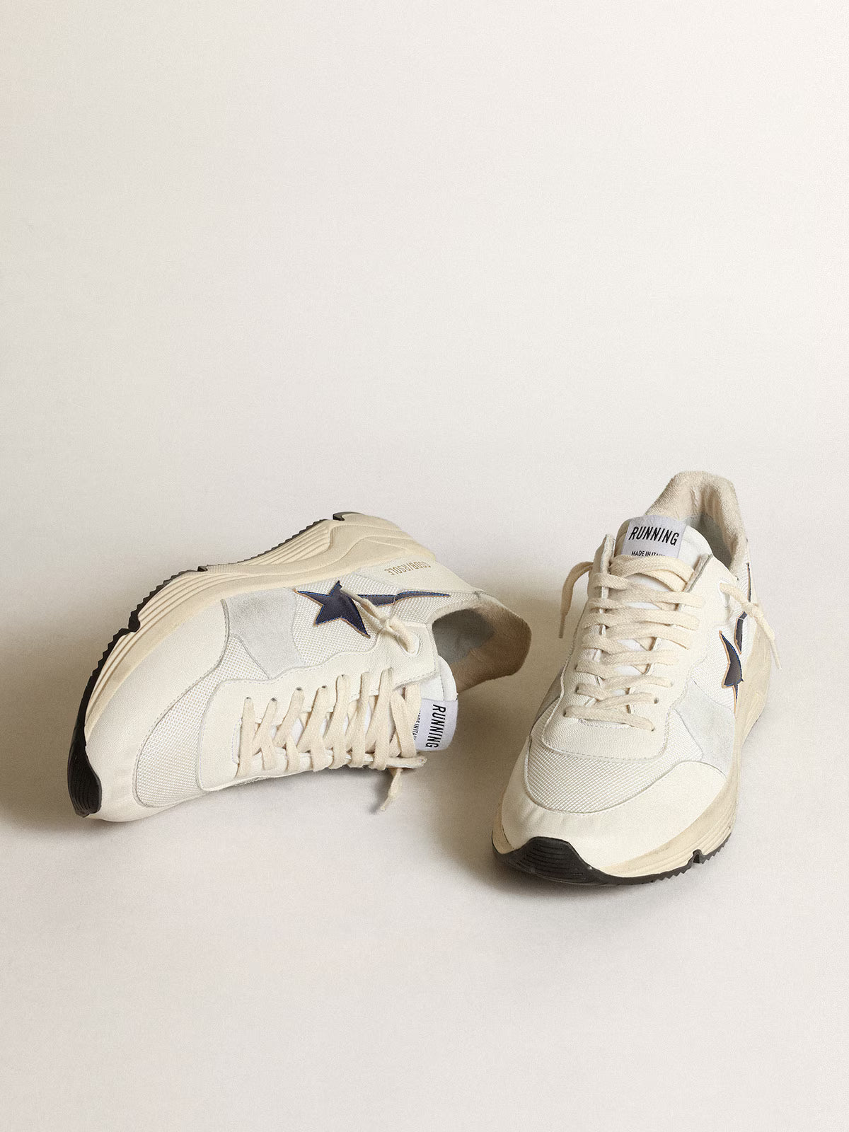 Golden Goose Running Sole in white leather
